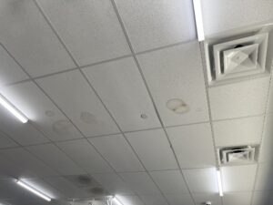 Signs of Commercial Roof Failure – Interior Water Damage DFW Office