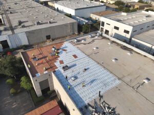 Hail damage apartment roof insurance claim DFW