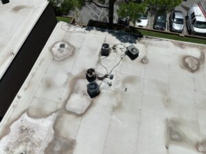 Multi-family roof maintenance DFW drain inspection