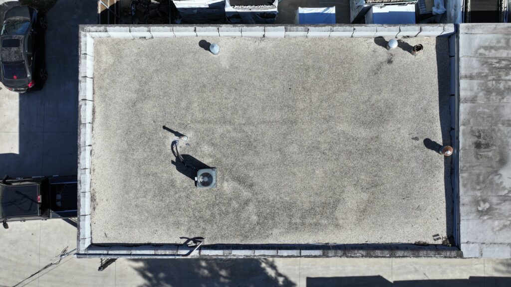 Commercial roof before restoration
